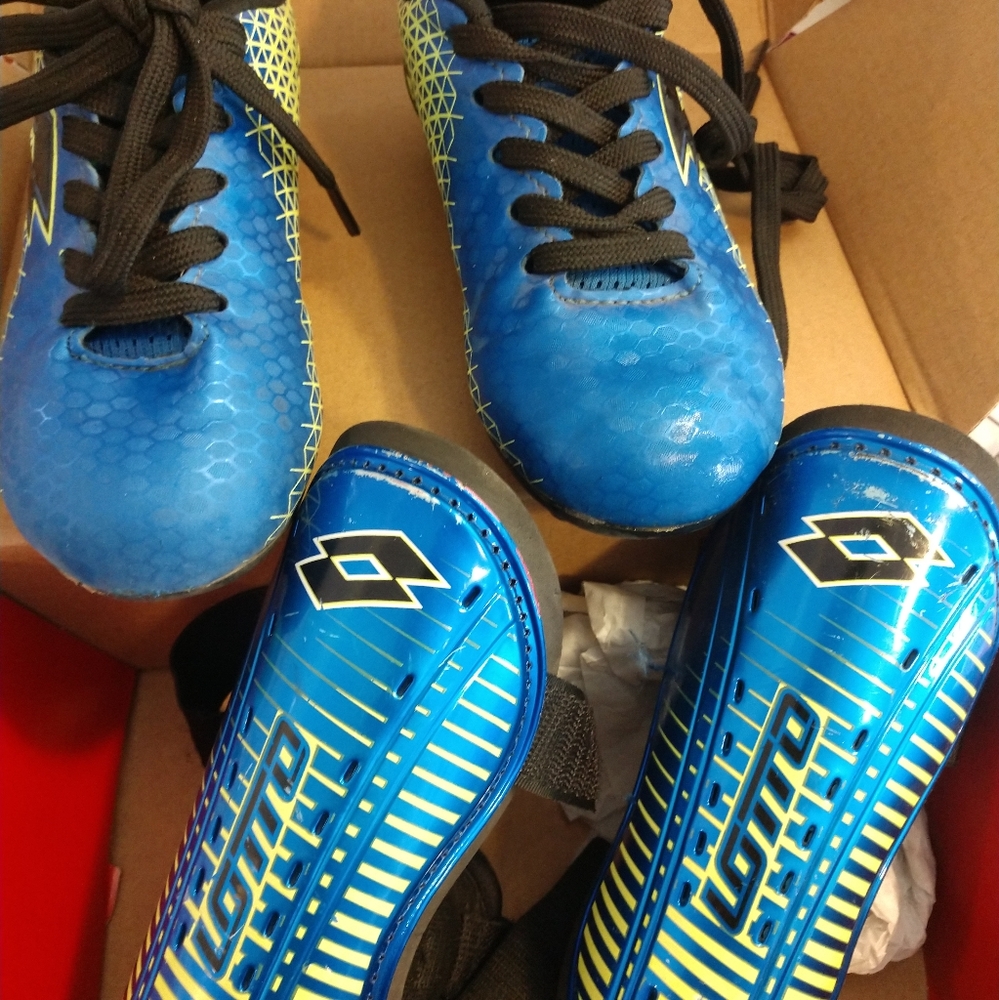 Kids soccer cleats and shin guards